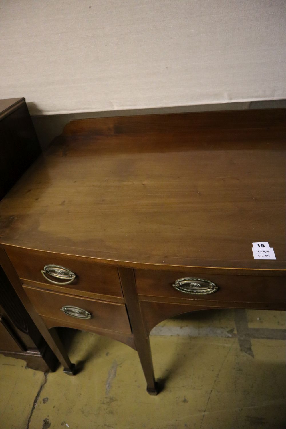 A George III mahogany bow fronted sideboard, width 137cm depth 67cm height 84cm